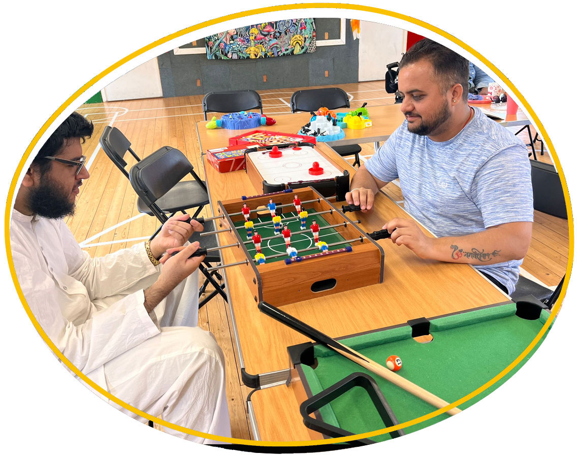 Two men playing table football